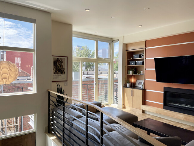 main level living area & sliding door to balcony - 2516 N Washington St