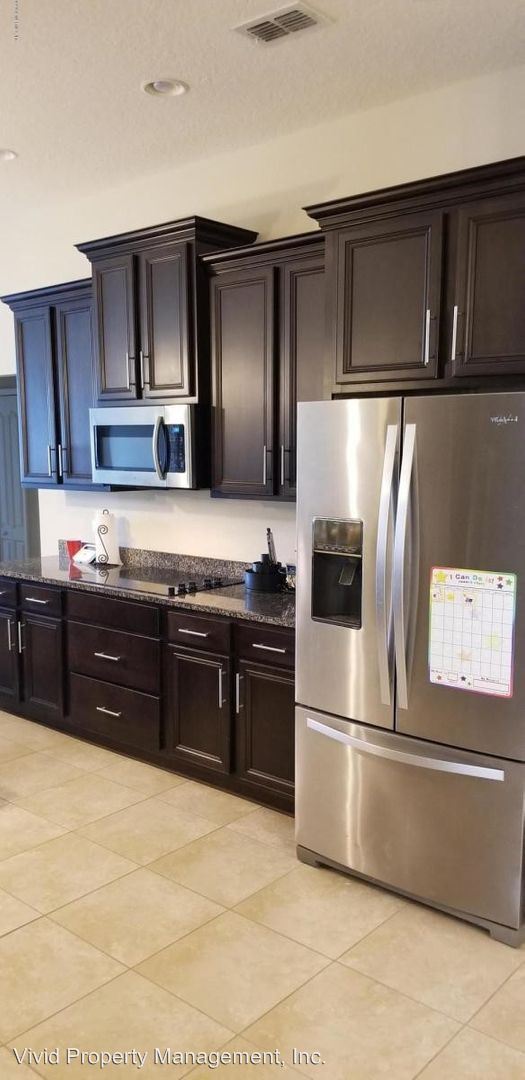 Foto del edificio - 4646 Plantation Oaks Blvd