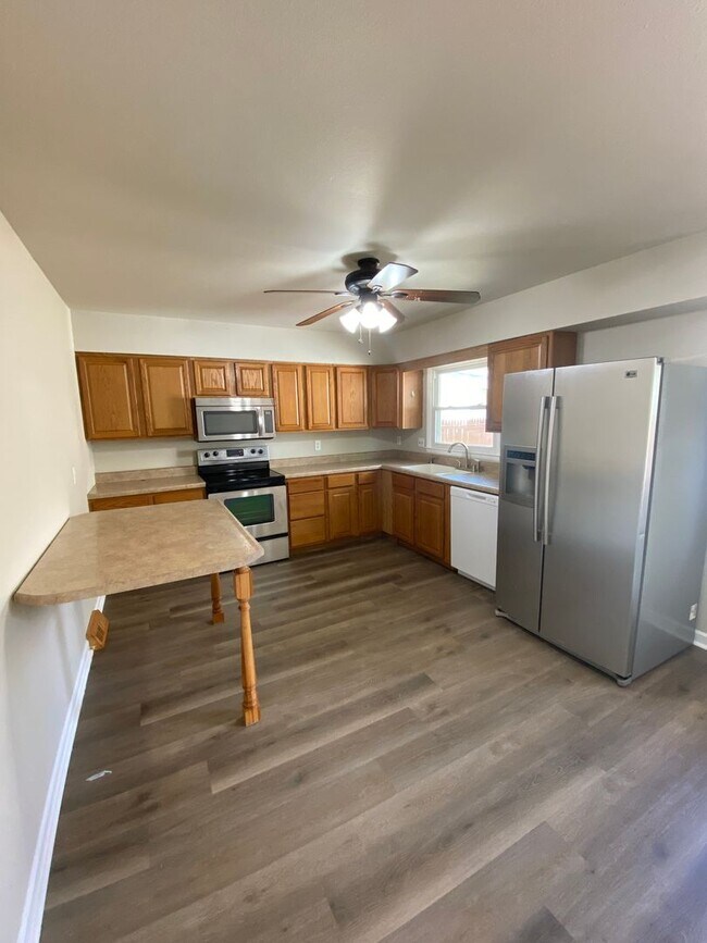 Building Photo - Updated 4 Bedroom with 2 Stall Garage
