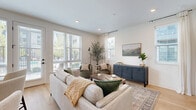 Located at 35 Flax Street in Delaware, Ohio, this well-appointed one-bedroom, one-bathroom residence offers a smartly efficient layout across a single floor. The open-concept kitchen and living area serves as the heart of the home, bathed in natural light from multiple large windows. The kitchen features crisp white shaker cabinetry with matte black hardware, a subway tile backsplash, stainless steel appliances, and a central island with pendant lighting and seating — ideal for both everyday meals and entertaining. Light-toned hardwood flooring flows seamlessly throughout the main living area, enhancing the bright, airy atmosphere. The living room provides a comfortable, welcoming retreat with generous wall space and recessed lighting. The bedroom is a calm, carpeted sanctuary with natural light from dual windows and includes access to a walk-in closet. The bathroom is finished with clean, modern fixtures including a glass-enclosed walk-in shower with matte black accents. Additional highlights include three closets for ample storage, an in-unit laundry area, and a private patio perfect for outdoor relaxation. The overall ambiance is clean, contemporary, and move-in ready.