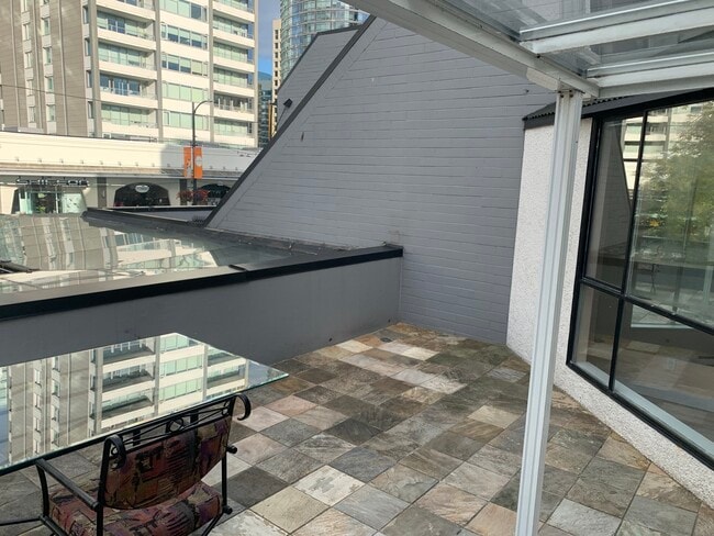 Huge deck overlooking Robson St. - 208-1270 Robson St