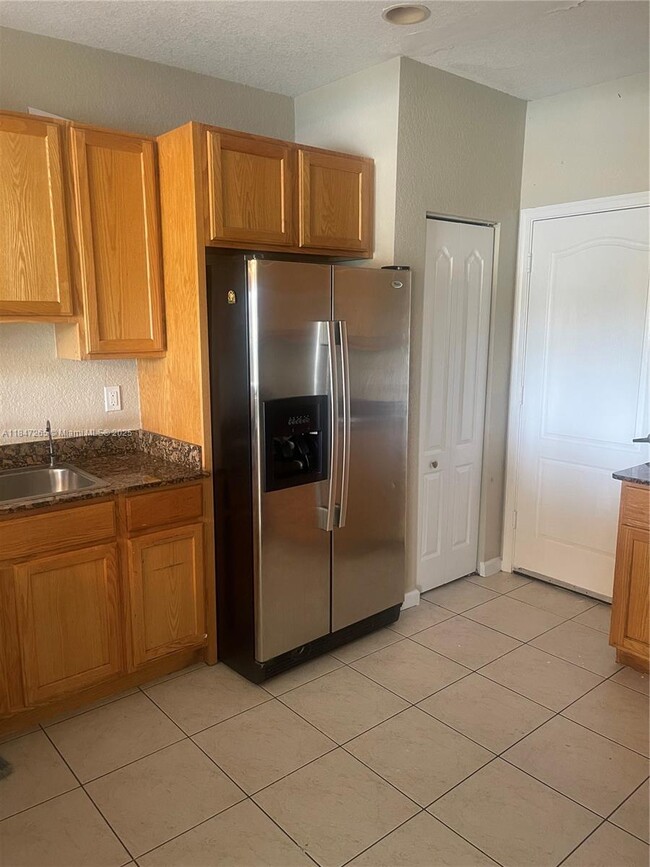 Building Photo - 4203 Cohune Palm Ct