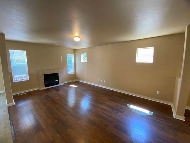 Building Photo - Perfectly Placed & Refreshed Spanaway Home...