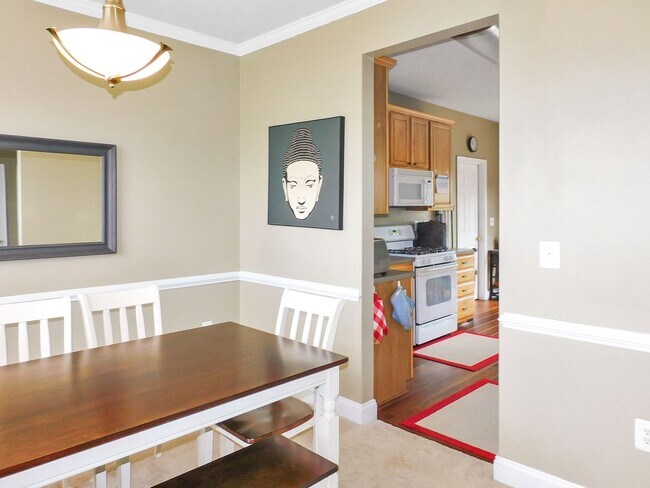 Building Photo - Colonial with Finished Basement and 2 Car ...