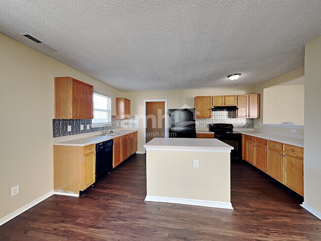 Foto del edificio - 9128 Stones Bluff Pl