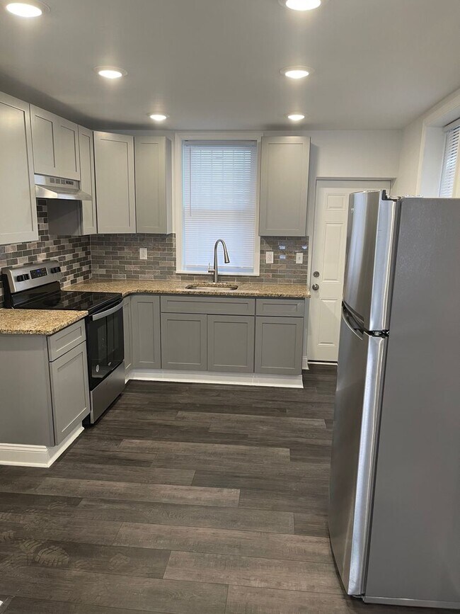 Building Photo - Beautifully Renovated 3 Bedroom House Now ...