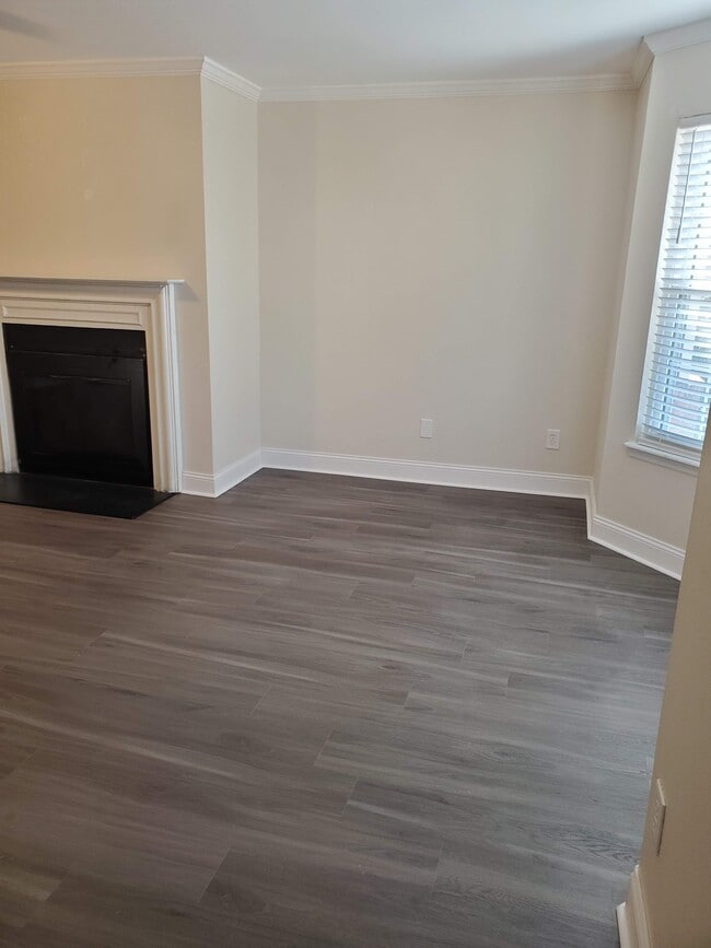 New LVP Flooring throughout entire downstairs. View from entry door. - 123 Ellington Plz