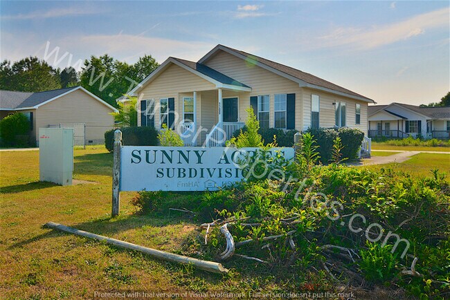 Building Photo - Cute Country 3 BR w/ Laminate Hardwoods