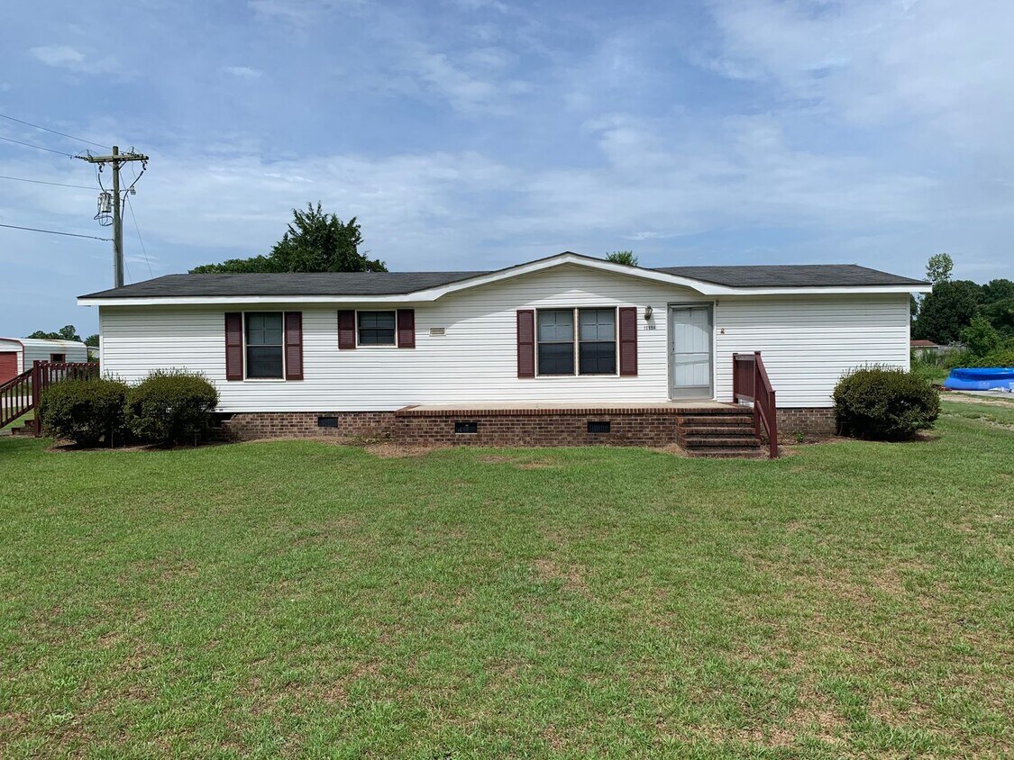 Primary Photo - Doublewide Mobile Home on Large Corner Lot