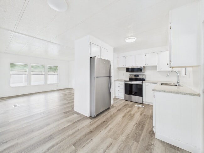 Building Photo - Completely Remodeled & Move-In Ready Home ...