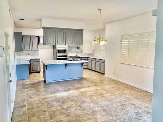 Building Photo - 4 br, 3 bath House - 1021 E Sarazen Ave