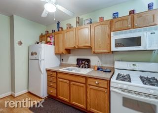 Foto principal - 1 br, 1 bath Condo - 6509 N Mozart St