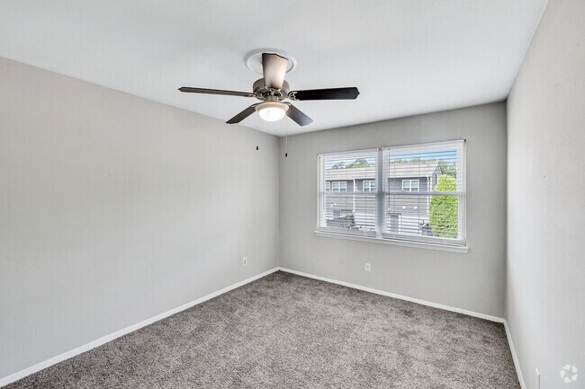 B1 -2BR, 1BA - 925SF - Bedroom - Lake Village Apartments
