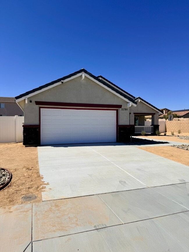 Building Photo - BRAND NEW 4 BEDROOM ADELANTO HOME