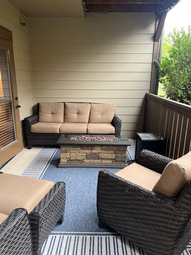Patio with gas fireplace - 6005 St Moritz Dr