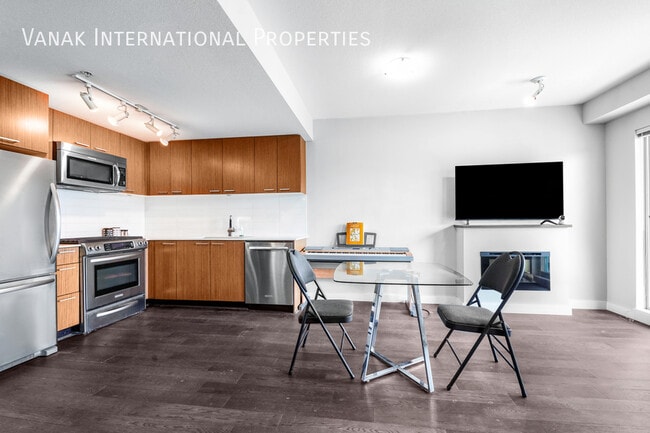 Building Photo - Modern Studio with Balcony, View & Parking...