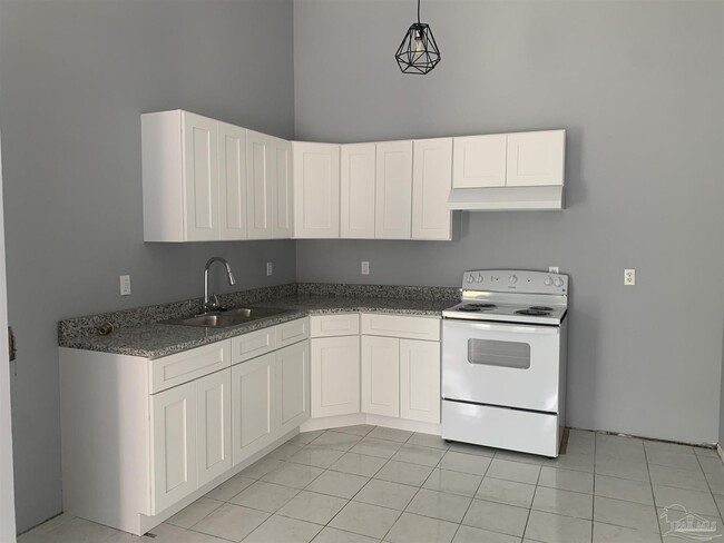 Building Photo - 6818 Tiki Ln