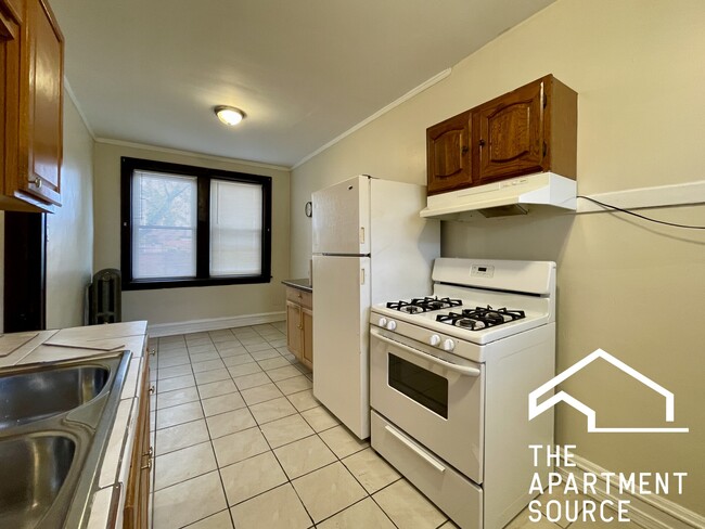 Building Photo - 2402 N Leclaire Ave