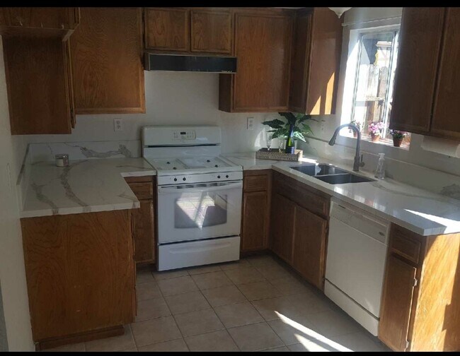 Kitchen New Quartz countertops , new stainless steel sink and tile floor - 434 Linwood Ave