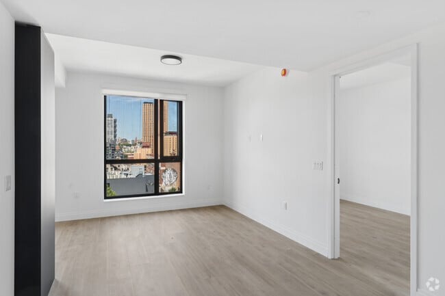 1BR, 1BA - 648SF - Living Room - 205 E 110th St