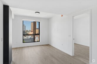 1BR, 1BA - 648SF - Living Room - 205 E 110th St