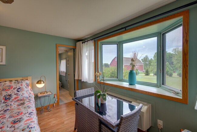 South-facing bay windows - 8283 N Riley Rd