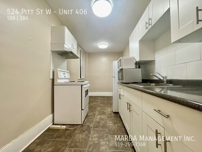 Building Photo - BEAUTIFULLY RENOVATED 1 BEDROOM/1 BATH UNI...