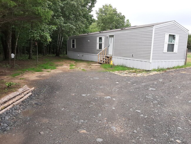 Building Photo - 2/2 Mfg. Home on 2.0 Acres Secluded/Rural ($840) for Lease in Romance AR