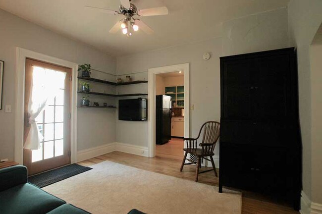 TV & bookshelves in Living Room - 310 Elmside Boulevard