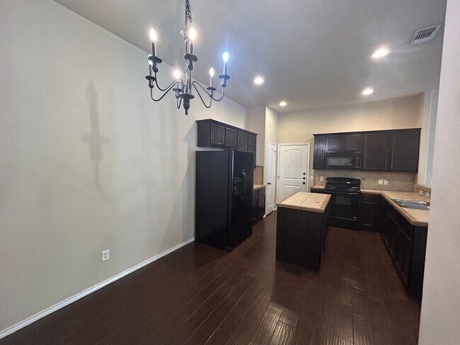 Building Photo - 3/2/2 Duplex off HWY 46 / Fridge / Interior Washer & Dryer Connections / Fenced in Backyard / CISD