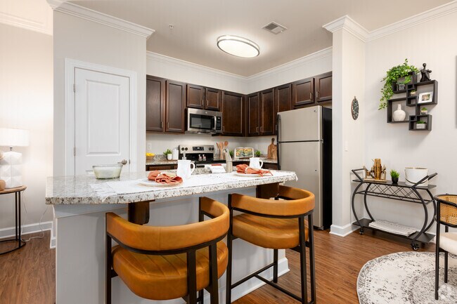 1 habitación, 1 baño - 872 pies cuadrados - Comedor - Fairway Village at Stoney Creek Apts