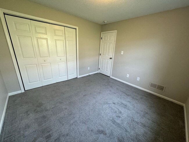 Building Photo - Coming Soon! Spacious 3-Bed Duplex with Garage