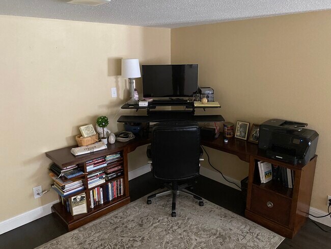 Front dining room with office setup - 3006 Cedarlawn Cir