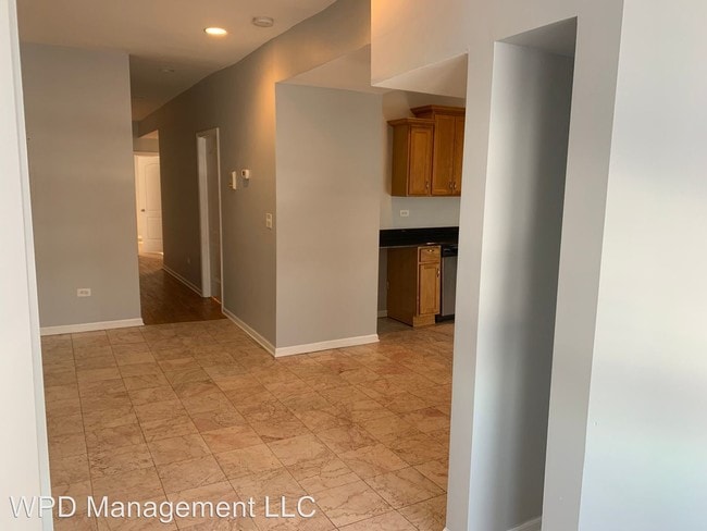 Building Photo - 7419 S Colfax Ave