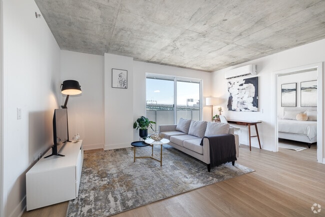 2BR, 1BA - 875SF - Living Room - Esplanade Cartier