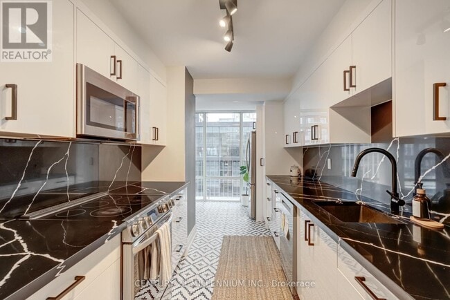 Photo du bâtiment - 330-330 Rathburn Rd W