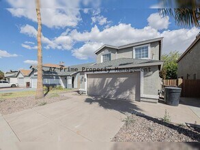 Building Photo - 7542 W Cinnabar Ave