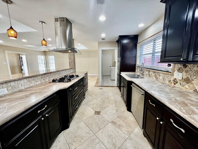 Foto del edificio - 9418 Meadowbriar Ln