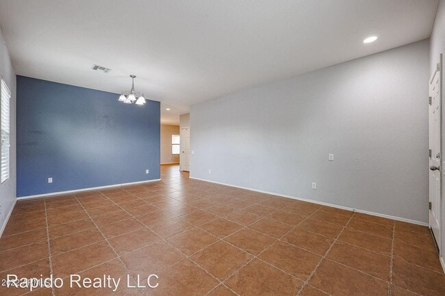Building Photo - 4 br, 2.5 bath House - 10856 W. Saddlehorn Rd