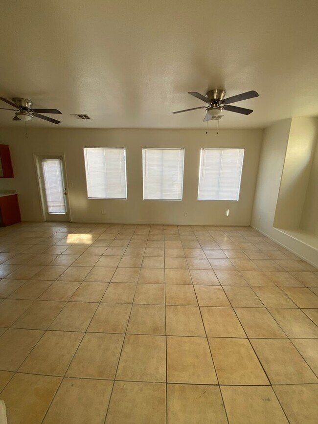 Building Photo - AMERICANA Property Mgmt - Spacious 4 beds, 2 story home in gated community in NLV near Aliante.