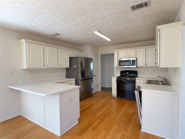 Foto del edificio - 5045 Saddle Bridge Ln