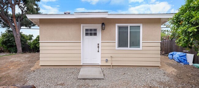 Building Photo - Introducing a charming bungalow-style unit...