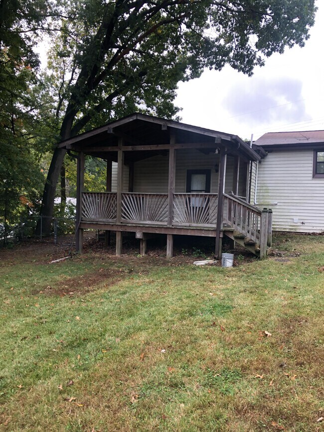 Covered deck with ceiling fan - 1782 Engle Dr