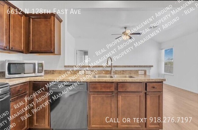 Foto del edificio - 6612 N 128th E Ave