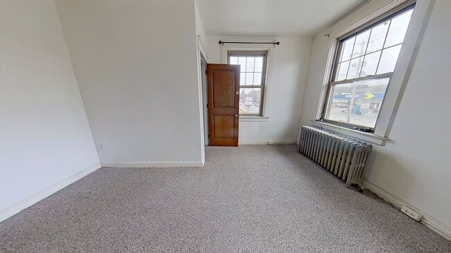 Building Photo - Comfortable 2-Bedroom Second-Floor Apartment