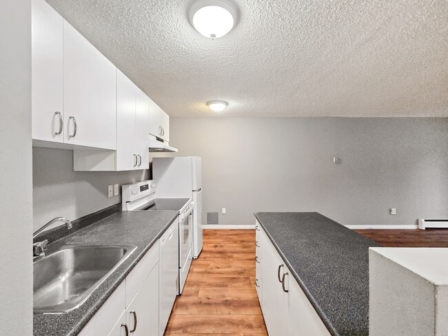 Photo du bâtiment - 1337-1313 13 Ave SW