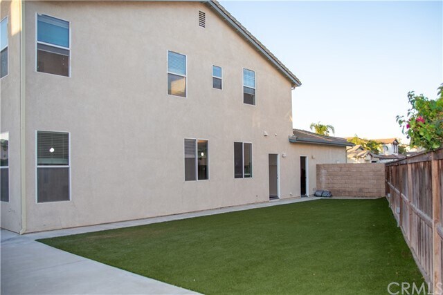 Building Photo - 7471 Wild Rose Dr