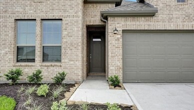 Building Photo - 810 Whispering Winds Dr