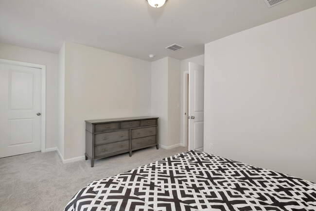 Large Upstairs Bedroom - 1201 Williams Cir