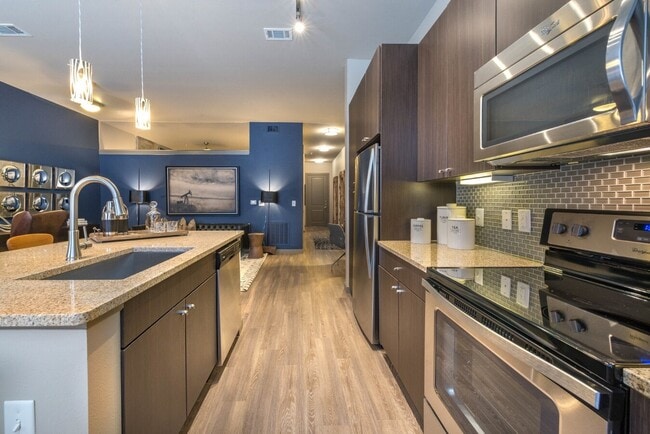 Building Photo - Modern Design Meets Everyday Luxury